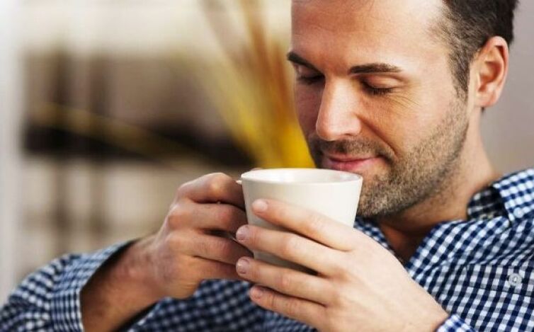 A man drinks fire grass tea to increase potency